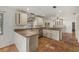 Well-appointed kitchen with white cabinets, granite countertops, and stainless steel appliances at 8255 Longbay Blvd, Sarasota, FL 34243
