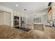 Kitchen with granite countertops, stainless steel appliances and tile flooring at 8255 Longbay Blvd, Sarasota, FL 34243