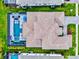 Overhead view of expansive home with private pool, spa and meticulously landscaped backyard at 8272 Redonda Loop, Bradenton, FL 34202