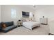 Comfortable bedroom with a plush bed, dresser, and natural light, creating a relaxing atmosphere at 8272 Redonda Loop, Bradenton, FL 34202