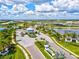 Stunning entrance to the community with a beautiful water feature and lush landscaping at 8272 Redonda Loop, Bradenton, FL 34202