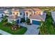 Stunning home with a paver driveway, meticulous landscaping, and a three-car garage at 8272 Redonda Loop, Bradenton, FL 34202