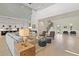 Spacious living room with soaring ceilings, hardwood floors and an open floor plan at 8272 Redonda Loop, Bradenton, FL 34202