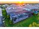 Aerial view of an enclosed pool and spa area perfect for relaxation and entertainment at 8272 Redonda Loop, Bradenton, FL 34202