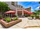 Cafe Epicure is a restaurant and take-out place with outdoor seating and red umbrellas at 8272 Redonda Loop, Bradenton, FL 34202