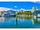 A luxurious yacht in a marina on a beautiful day with clear blue water at 8272 Redonda Loop, Bradenton, FL 34202