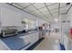 Functional community kitchen with modern appliances and ample counter space for community events and gatherings at 860 Virginia St # 304, Dunedin, FL 34698