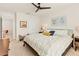 Bright main bedroom with neutral paint, carpet and ensuite bathroom at 8628 Milestone Dr, Sarasota, FL 34238