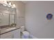 Bathroom featuring modern vanity with drawers, white countertops, and shower at 8916 Isabella Cir, Parrish, FL 34219