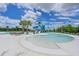 Expansive community pool area with a thrilling water slide for endless fun at 8916 Isabella Cir, Parrish, FL 34219