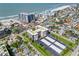 Beautiful aerial view of Lido Towers condos and the ocean in the distance at 1001 Benjamin Franklin Dr # 106, Sarasota, FL 34236