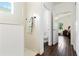 Bathroom features tiled walls, dark wood floors, and modern fixtures at 10926 Sand Pine Ln, Parrish, FL 34219
