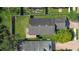 Aerial view of home showcasing its private backyard with patio and lush green lawn at 110 San Lorenzo Ct, Bradenton, FL 34208