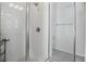 Bright bathroom showcasing tile shower with glass door and brushed gold fixtures at 110 San Lorenzo Ct, Bradenton, FL 34208