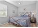 Comfortable bedroom with a neutral color scheme and ample natural light from the window at 11410 57Th E St, Parrish, FL 34219