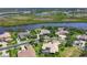 A lovely home with a private dock and pool is nestled on a waterfront property at 11807 Rive Isle Run, Parrish, FL 34219