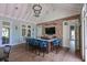 Spacious bar area with ample seating and charming brick wall at 11807 Rive Isle Run, Parrish, FL 34219