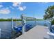 View of a boat lift on the water at 11807 Rive Isle Run, Parrish, FL 34219