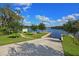 Convenient community boat ramp with easy access to the water, surrounded by well-maintained landscaping and scenic views at 11807 Rive Isle Run, Parrish, FL 34219