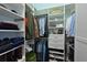 Spacious closet featuring custom shelving, hanging racks, and plenty of storage space for shoes and clothing at 11807 Rive Isle Run, Parrish, FL 34219