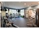 Well-equipped home gym with modern exercise equipment, offering a convenient and private space for fitness activities at 11807 Rive Isle Run, Parrish, FL 34219