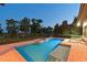 Inviting backyard pool and spa area featuring brick pavers and relaxing chaise lounge at 11807 Rive Isle Run, Parrish, FL 34219