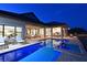 Stunning backyard pool with an attached hot tub and lounge chairs on a brick-paved patio at 11807 Rive Isle Run, Parrish, FL 34219