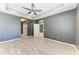 Large, airy bedroom offers ample space, and light-colored flooring at 11811 Fennemore Way, Parrish, FL 34219