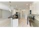 Modern kitchen boasting granite countertops, stainless steel appliances, and an open layout at 11811 Fennemore Way, Parrish, FL 34219