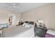 Comfortable bedroom featuring neutral tones, ceiling fan and two dressers, providing ample storage and relaxation at 1355 Rock Dove Ct # 1-2, Punta Gorda, FL 33950
