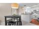 Casual dining area adjacent to kitchen features a modern table and seating at 1355 Rock Dove Ct # 1-2, Punta Gorda, FL 33950
