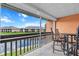 Screened lanai offering picturesque waterfront views and comfortable seating to enjoy the outdoors at 1355 Rock Dove Ct # 1-2, Punta Gorda, FL 33950