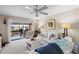 Cozy living room with bright furniture, balcony access, and ample natural light at 1355 Rock Dove Ct # 1-2, Punta Gorda, FL 33950