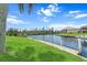 Waterfront canal view, showcasing dock access and scenic surroundings at 1355 Rock Dove Ct # 1-2, Punta Gorda, FL 33950