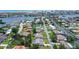 Aerial view showcasing neighborhood with water views, highlighting the property's prime location at 1626 Ridgewood Ln, Sarasota, FL 34231