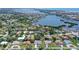 Aerial view showcasing the property's location near the water with views of the surrounding neighborhood at 1626 Ridgewood Ln, Sarasota, FL 34231