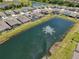 Beautiful aerial shot of the community with water features and well kept landscaping at 17536 Cantarina Cv, Bradenton, FL 34211