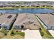 Beautiful single-Gathering home with well-manicured landscaping and a picturesque lake view at 17536 Cantarina Cv, Bradenton, FL 34211