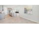 Spacious kitchen flows into the living area, perfect for entertaining and modern living at 17536 Cantarina Cv, Bradenton, FL 34211