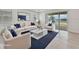 Stylishly staged living room with modern decor at 17536 Cantarina Cv, Bradenton, FL 34211