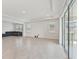Open-concept floorplan with lots of natural light, tile floors, and access to the backyard at 17536 Cantarina Cv, Bradenton, FL 34211