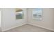 Bright room featuring tile flooring, windows, and a view at 17536 Cantarina Cv, Bradenton, FL 34211