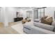 Comfortable living room features a stylish sofa, modern decor, and an open floor plan design at 1801 W Saint Isabel St, Tampa, FL 33607