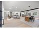 Spacious open-concept living area with modern finishes, a dining area and lots of natural light at 1801 W Saint Isabel St, Tampa, FL 33607