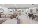 Open living space showcasing the kitchen, dining area, and living room with comfortable seating at 1801 W Saint Isabel St, Tampa, FL 33607