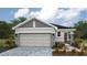 Charming single-Gathering home with a two-car garage and stone detailing at 1856 Cobb Trl, Parrish, FL 34219