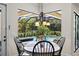 Breakfast nook view of screened pool at 2152 Majestic Oaks Blvd, Clearwater, FL 33759
