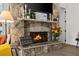 Close up on the stone fireplace and mantle at 2152 Majestic Oaks Blvd, Clearwater, FL 33759
