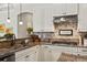 Modern kitchen with stainless steel appliances and designer countertops at 2152 Majestic Oaks Blvd, Clearwater, FL 33759