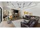 A comfortable living room is centered by a stone fireplace at 2152 Majestic Oaks Blvd, Clearwater, FL 33759